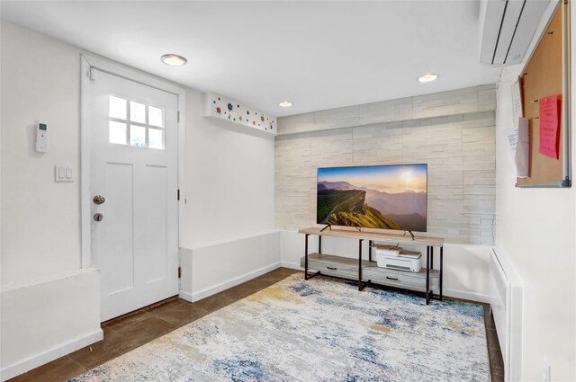 405 Miller Ave, Freeport, NY 11520 - entryway with baseboards, recessed lighting, and an AC wall unit