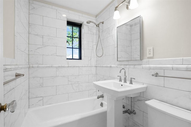 66 Milton Rd Unit C42, Rye, NY 10580 - bathroom featuring tub / shower combination, toilet, and tile walls