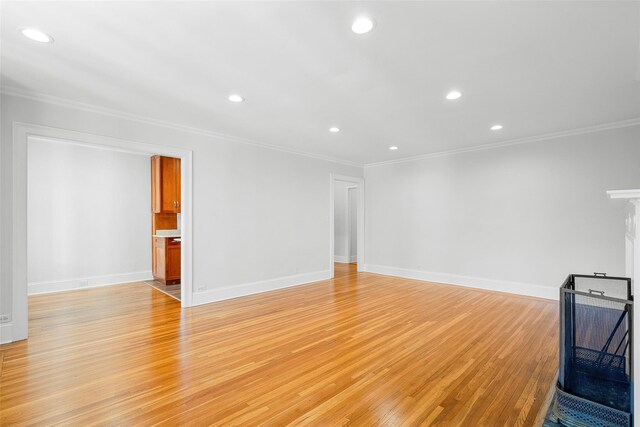 66 Milton Rd Unit C42, Rye, NY 10580 - unfurnished living room with crown molding, recessed lighting, light wood finished floors, and baseboards