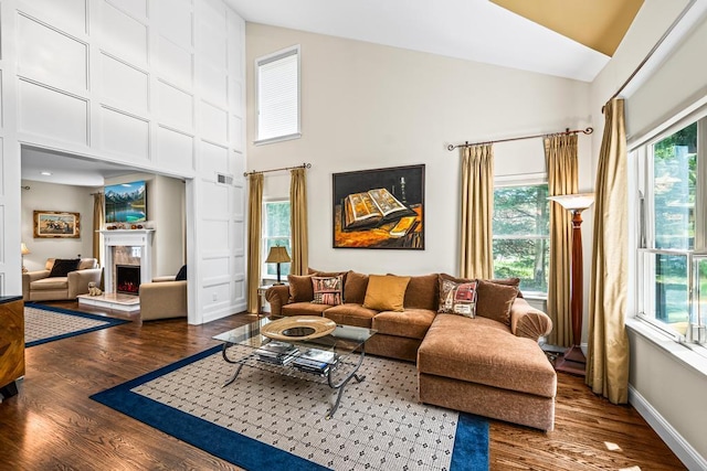 31 Inlet View Path, East Moriches, NY 11940 - living room with high vaulted ceiling, wood finished floors, and a fireplace