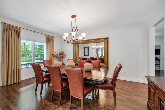 31 Inlet View Path, East Moriches, NY 11940 - dining space with a chandelier, dark wood finished floors, and baseboards