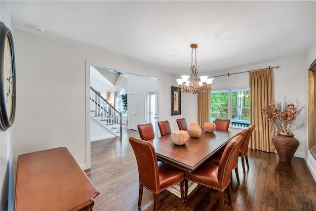 31 Inlet View Path, East Moriches, NY 11940 - dining area with stairway, wood finished floors, a chandelier, and baseboards