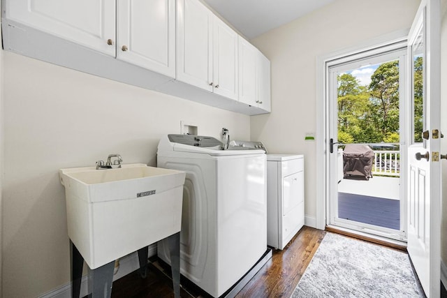31 Inlet View Path, East Moriches, NY 11940 - laundry area featuring washer and clothes dryer, cabinet space, and dark wood finished floors