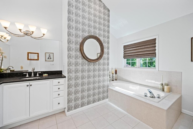 31 Inlet View Path, East Moriches, NY 11940 - bathroom with a garden tub, vanity, tile patterned floors, a chandelier, and vaulted ceiling