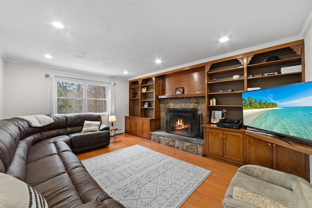 123 E St, South Salem, NY 10590 - living room featuring ornamental molding, a fireplace, recessed lighting, and light wood-type flooring