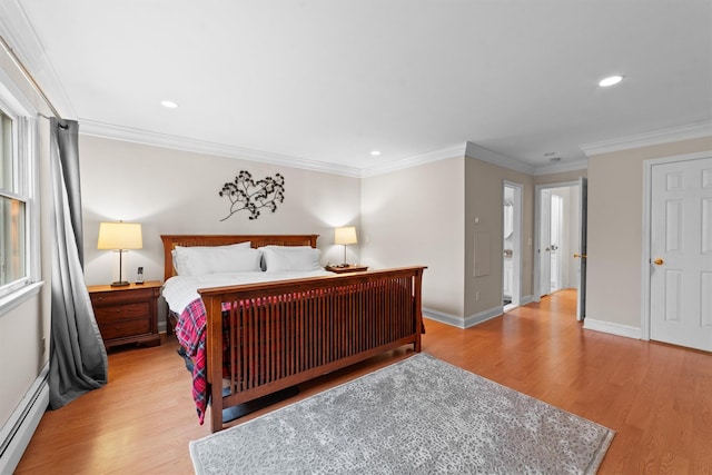 123 E St, South Salem, NY 10590 - bedroom with a baseboard radiator, light wood-style flooring, crown molding, recessed lighting, and baseboards