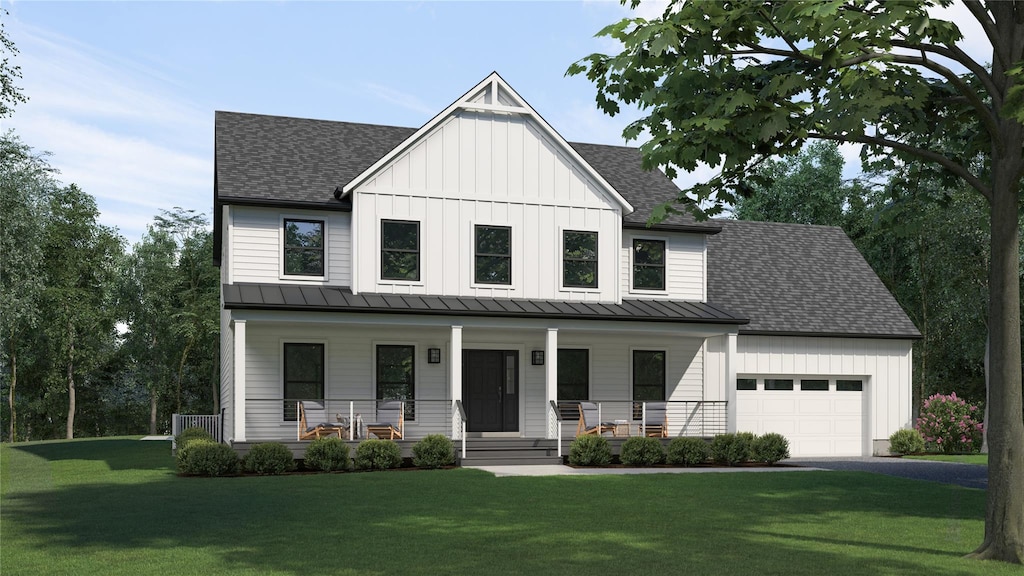 33 Doug Ln, South Jamesport, NY 11970 - modern farmhouse with an attached garage, board and batten siding, a standing seam roof, a porch, and a front yard