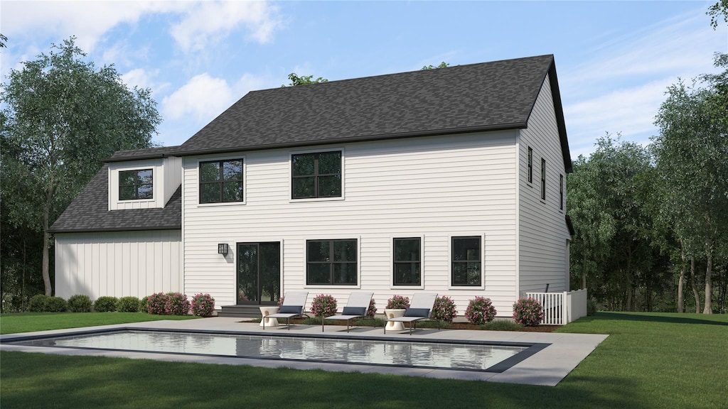 33 Doug Ln, South Jamesport, NY 11970 - rear view of house with a lawn and roof with shingles