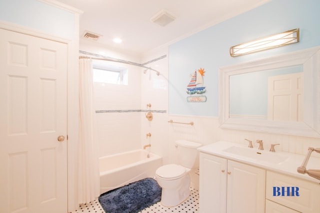 120 Norfolk St, Brooklyn, NY 11235 - bathroom with toilet, vanity, a wainscoted wall, shower / bath combo with shower curtain, and tile patterned flooring