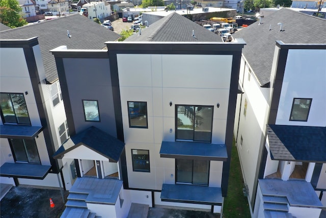 back of house with stucco siding