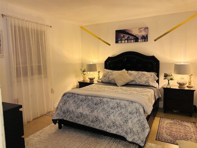 bedroom featuring tile patterned floors