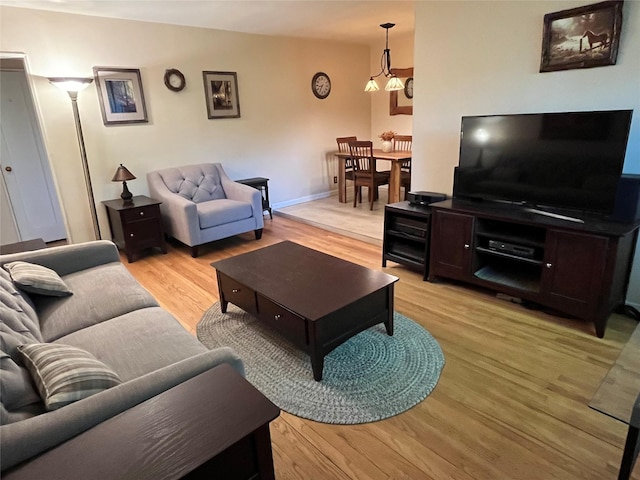 19933 22nd Avenue -, Whitestone, NY 11357 - living area featuring light wood-type flooring and baseboards