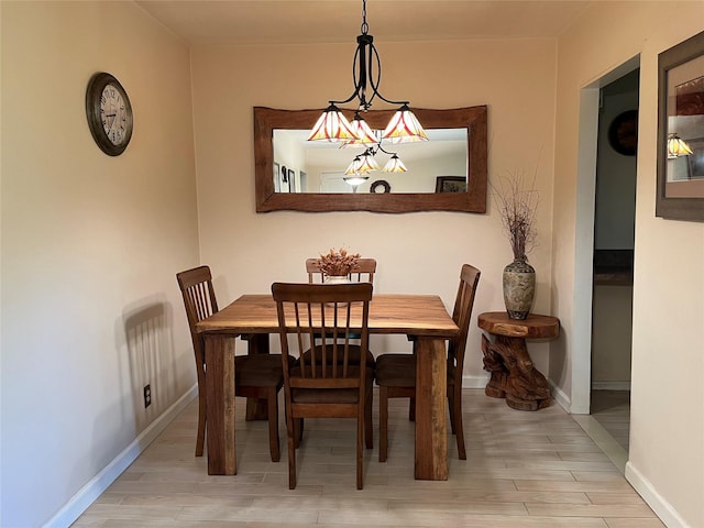 19933 22nd Avenue -, Whitestone, NY 11357 - dining room featuring light wood-style flooring and baseboards