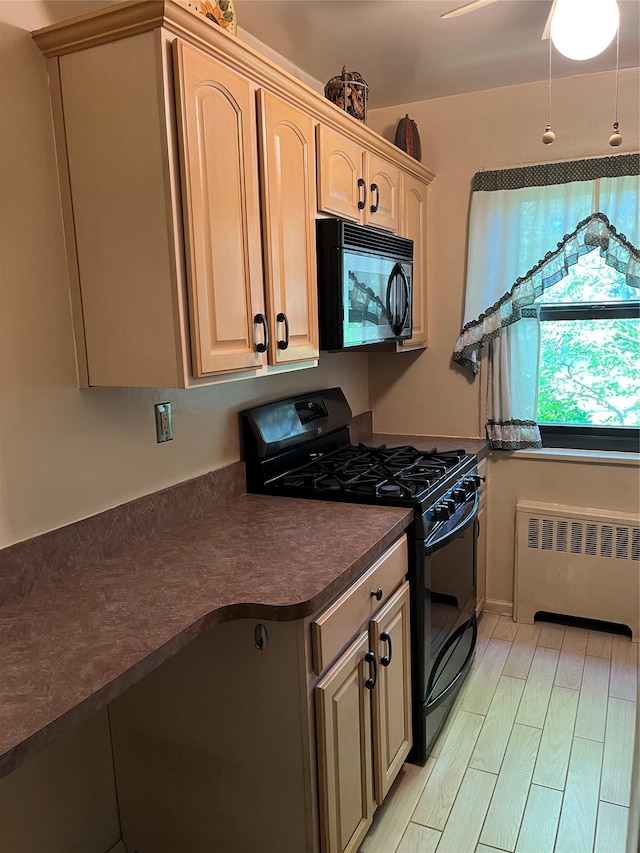 19933 22nd Avenue -, Whitestone, NY 11357 - kitchen with black appliances, radiator, dark countertops, light wood-type flooring, and light brown cabinetry