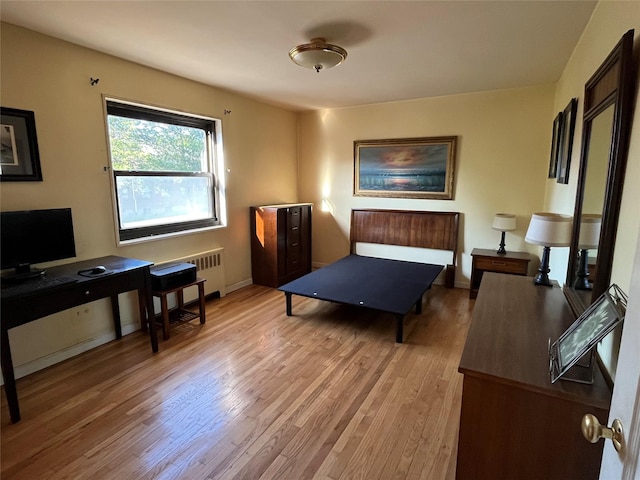 19933 22nd Avenue -, Whitestone, NY 11357 - bedroom with light wood-style floors and baseboards