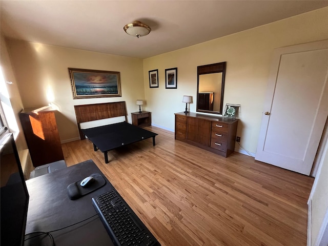 19933 22nd Avenue -, Whitestone, NY 11357 - bedroom featuring light wood-style floors, a desk, and baseboards