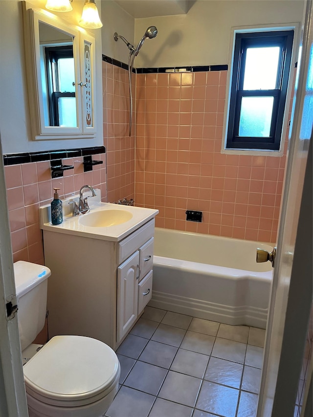 19933 22nd Avenue -, Whitestone, NY 11357 - full bathroom featuring tile patterned floors, toilet, vanity, tile walls, and bathing tub / shower combination