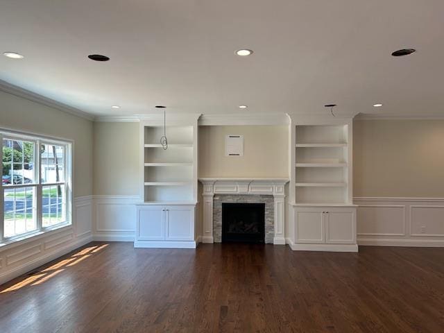 110B Louis St, Massapequa, NY 11758 - unfurnished living room featuring recessed lighting, dark wood-style flooring, a wainscoted wall, built in shelves, and ornamental molding