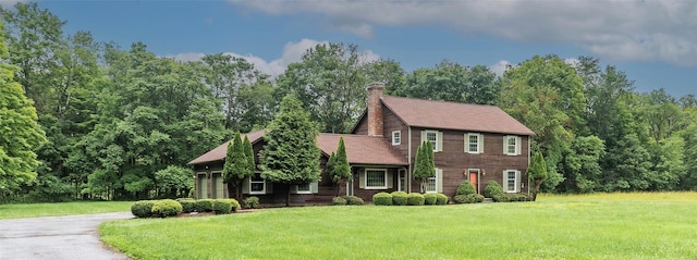 162 Lippincott Rd, Wallkill, NY 12589 - colonial home with a front lawn, a garage, driveway, and a chimney