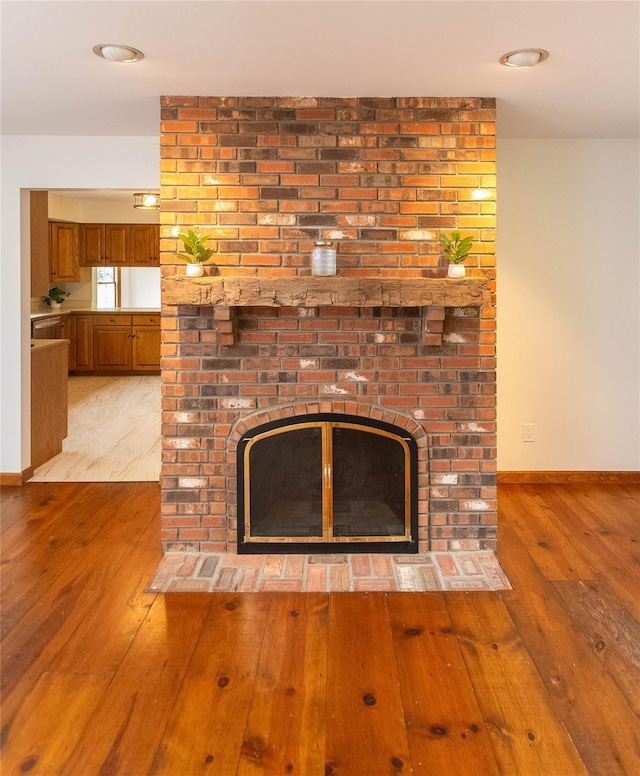 162 Lippincott Rd, Wallkill, NY 12589 - detailed view of a brick fireplace and wood finished floors