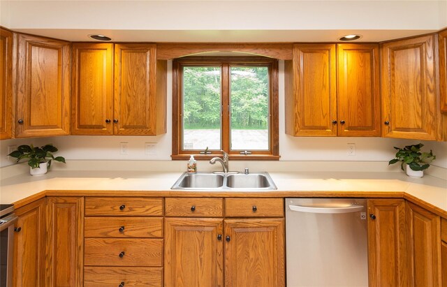162 Lippincott Rd, Wallkill, NY 12589 - kitchen featuring dishwasher, light countertops, and brown cabinetry