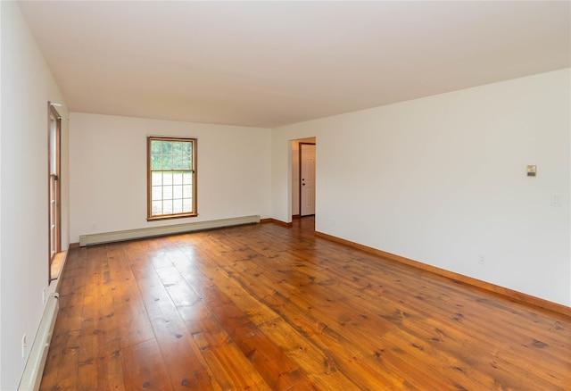 162 Lippincott Rd, Wallkill, NY 12589 - spare room with baseboard heating and hardwood / wood-style flooring
