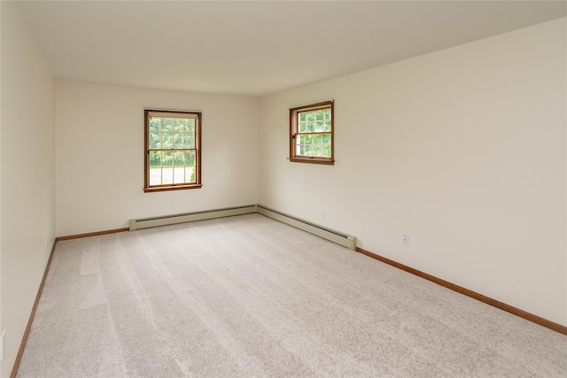 162 Lippincott Rd, Wallkill, NY 12589 - unfurnished room featuring healthy amount of natural light, light colored carpet, and a baseboard heating unit