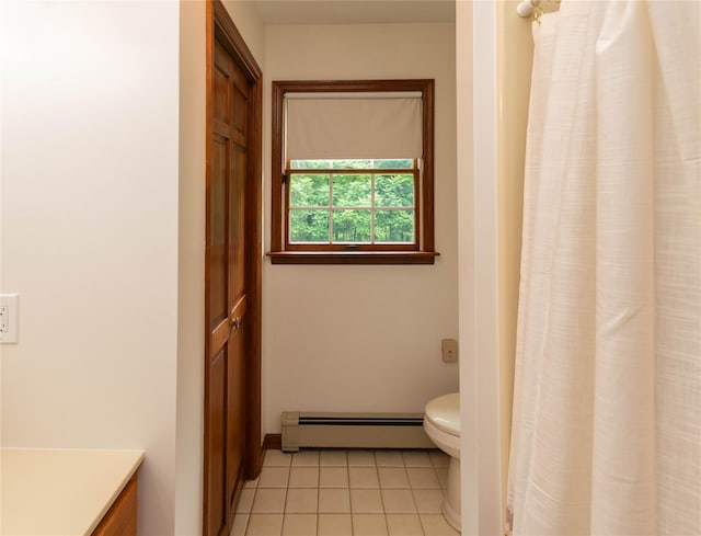162 Lippincott Rd, Wallkill, NY 12589 - bathroom with a baseboard heating unit, tile patterned flooring, vanity, and a shower with curtain