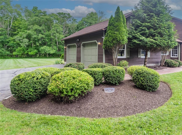 162 Lippincott Rd, Wallkill, NY 12589 - view of front of property featuring a front lawn, an attached garage, and a shingled roof