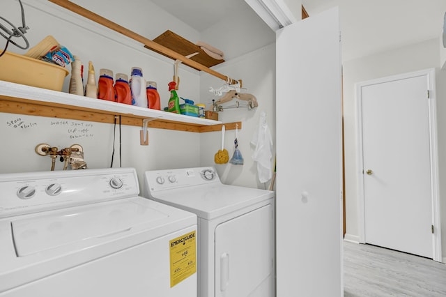 48 Old Lake Rd, Congers, NY 10920 - washroom featuring washer and dryer and light wood finished floors