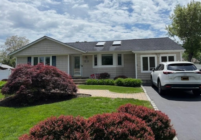 182 S Plaisted Ave, Hauppauge, NY 11788 - ranch-style house featuring a front lawn and roof with shingles