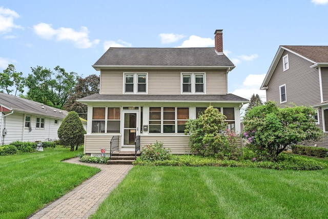 323 Hooker Ave, Poughkeepsie, NY 12603 - traditional style home with a chimney, a front yard, and a shingled roof