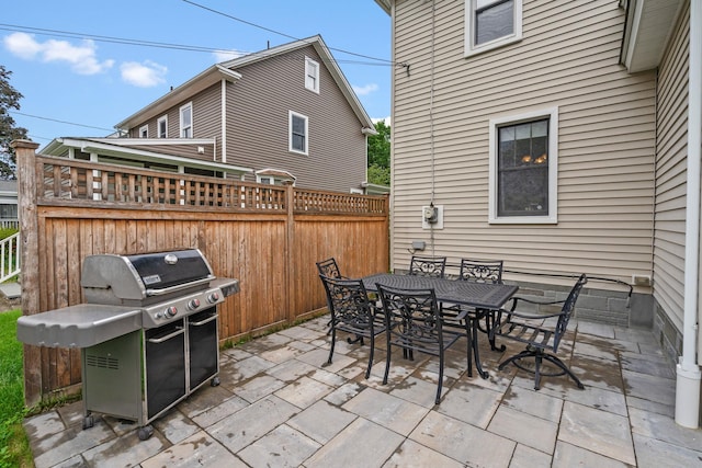 323 Hooker Ave, Poughkeepsie, NY 12603 - view of patio / terrace featuring area for grilling, fence, and outdoor dining area