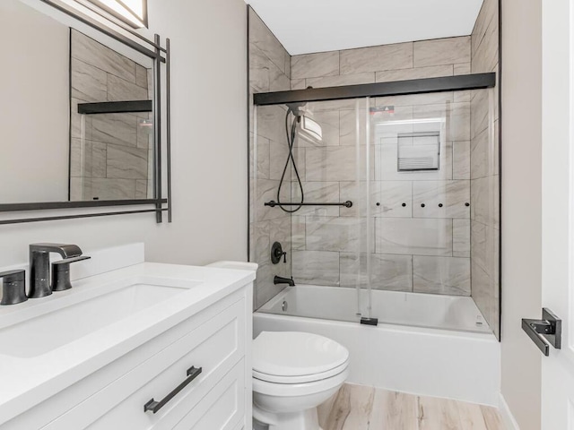 117 Sunset Blvd Unit 10117, Bronx, NY 10473 - bathroom featuring toilet, enclosed tub / shower combo, vanity, and wood finished floors