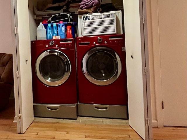 2813 W 30th St, Brooklyn, NY 11224 - laundry area featuring washer and dryer and wood finished floors
