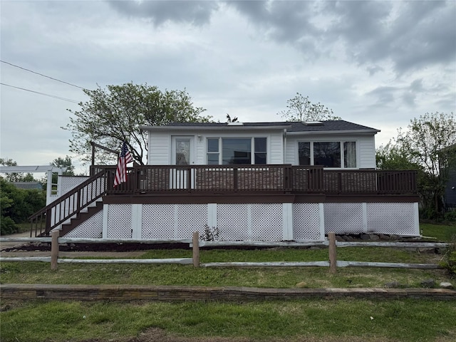 812 Beach St, Lindenhurst, NY 11757 - rear view of property with a wooden deck, fence, and stairs