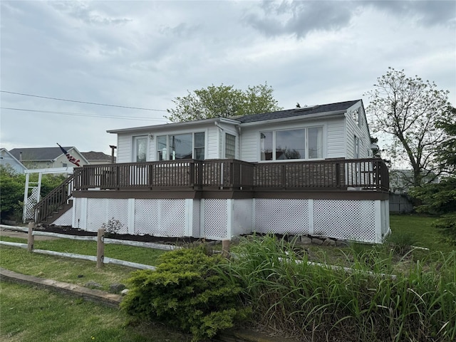 812 Beach St, Lindenhurst, NY 11757 - back of house with a deck and a yard