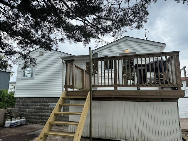 812 Beach St, Lindenhurst, NY 11757 - rear view of house featuring a deck and stairway