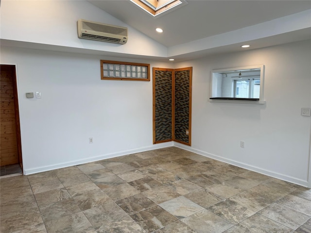 812 Beach St, Lindenhurst, NY 11757 - unfurnished room featuring an AC wall unit, recessed lighting, lofted ceiling, stone finish floors, and baseboards
