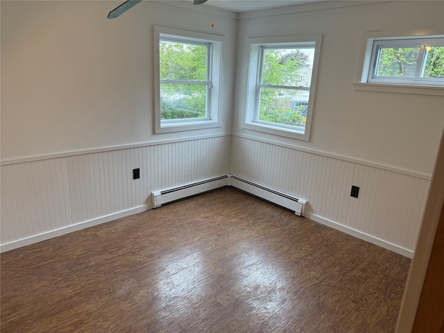 812 Beach St, Lindenhurst, NY 11757 - unfurnished room with a wainscoted wall, ceiling fan, and wood finished floors