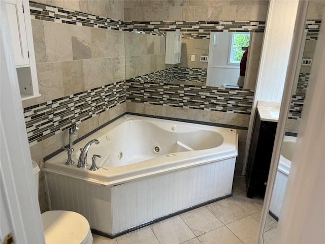 812 Beach St, Lindenhurst, NY 11757 - full bath with a whirlpool tub, tile patterned floors, and toilet