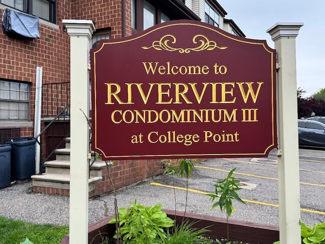 120-16 Cove Ct Unit 87A, College Point, NY 11356 - community sign with uncovered parking