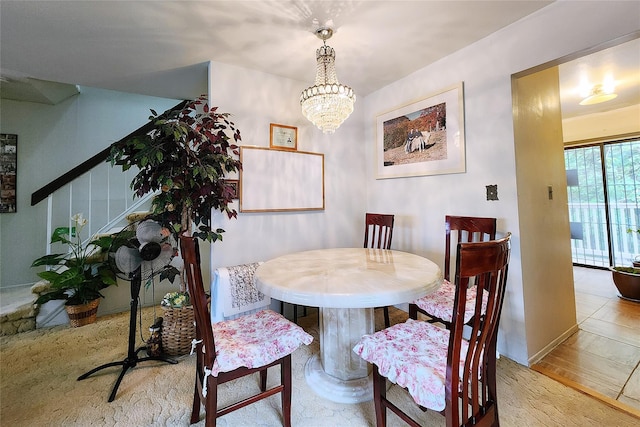 120-16 Cove Ct Unit 87A, College Point, NY 11356 - dining room with a chandelier
