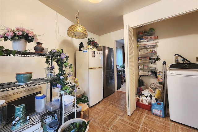 120-16 Cove Ct Unit 87A, College Point, NY 11356 - kitchen featuring washer / clothes dryer and freestanding refrigerator