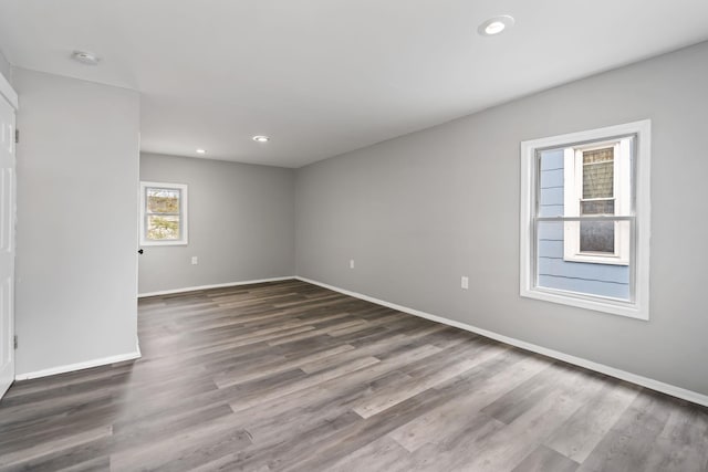 7 Grant St, Poughkeepsie, NY 12601 - spare room featuring baseboards, wood finished floors, recessed lighting, and a smoke detector