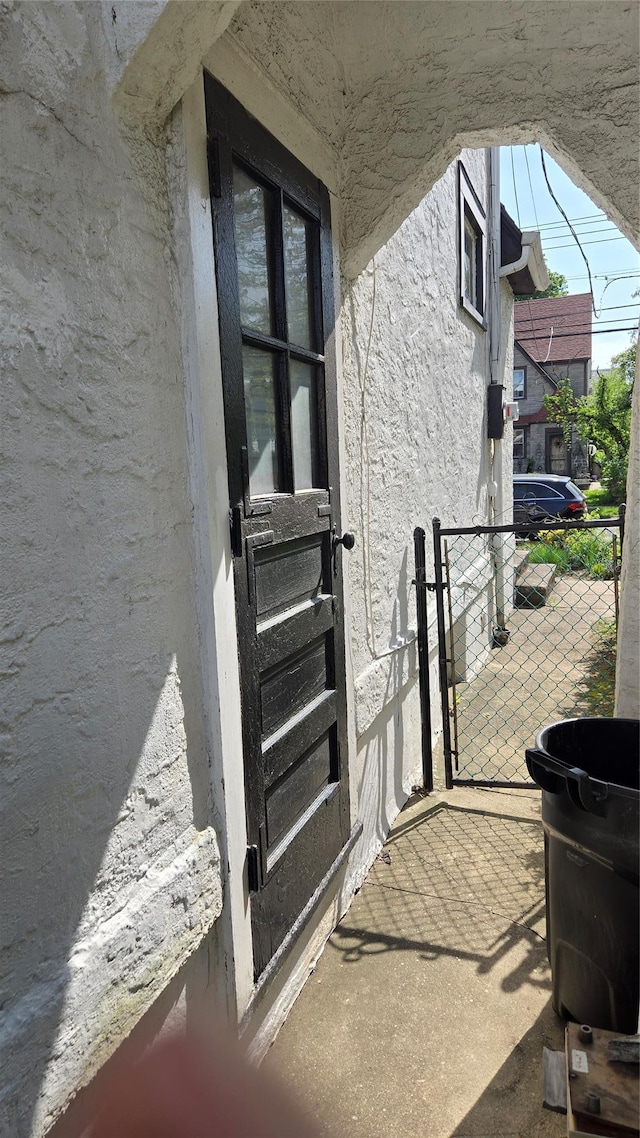 11419 179th St, Addisleigh Park, NY 11434 - property entrance with stucco siding and a patio