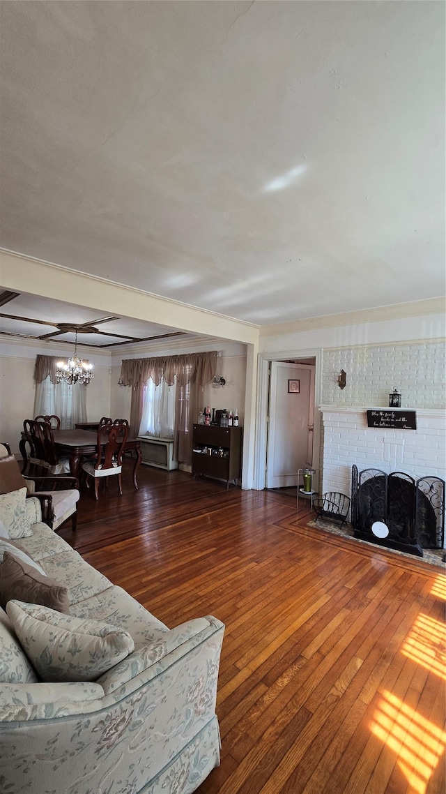11419 179th St, Addisleigh Park, NY 11434 - living room featuring wood-type flooring, a chandelier, and ornamental molding