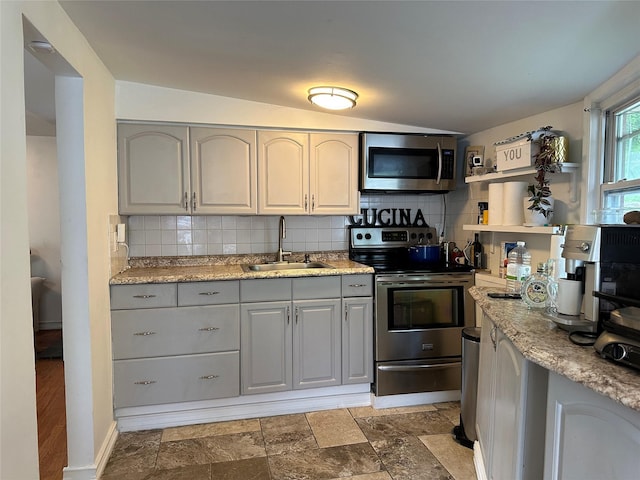 214SHOREDRIVE Shore Dr, Brewster, NY 10509 - kitchen with appliances with stainless steel finishes, a sink, gray cabinets, and vaulted ceiling