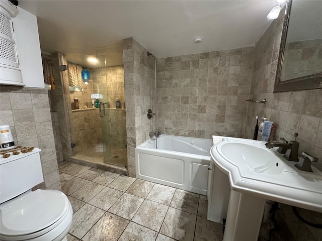 214SHOREDRIVE Shore Dr, Brewster, NY 10509 - bathroom with tile walls, a stall shower, a garden tub, toilet, and tile patterned floors