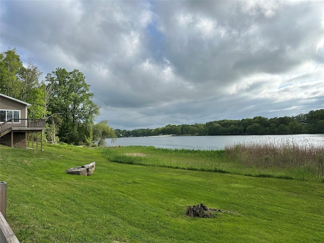 214SHOREDRIVE Shore Dr, Brewster, NY 10509 - view of green lawn featuring a deck with water view